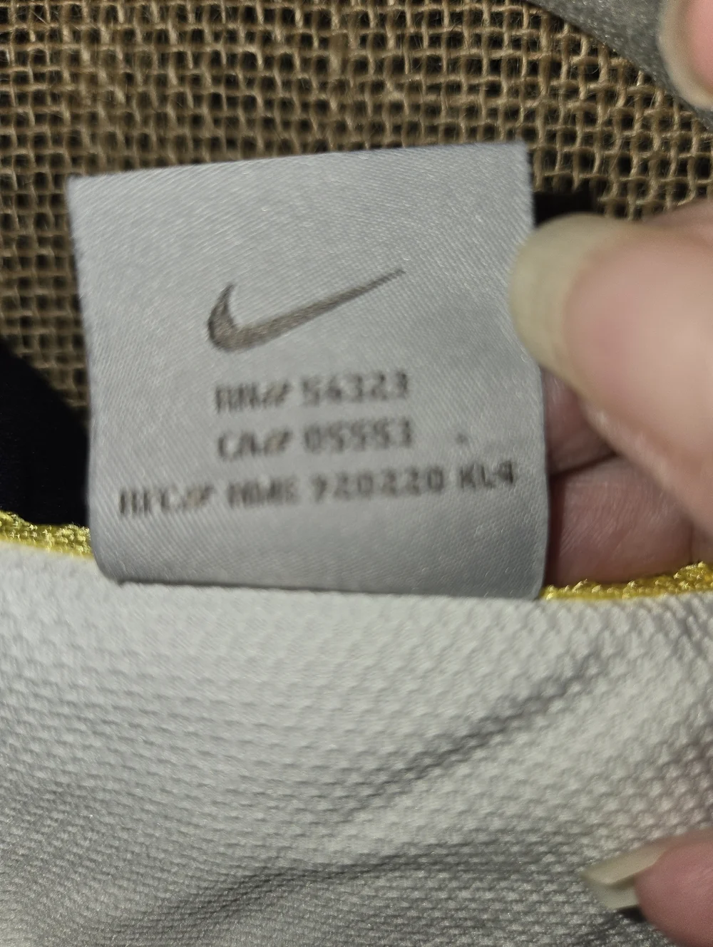 Nike White Sleeveless Polo Tank with Black Trim and Yellow Logo